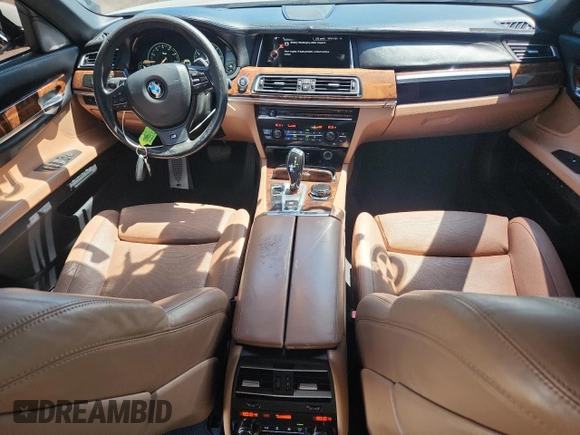 2015 BMW 7 Series 750Li with VIN WBAYE8C59FD782291, listed as a Copart auction lot 65119745 with 159,479 mi miles and Salvage title. Bid and sale history available at DreamBid. Image 8.
