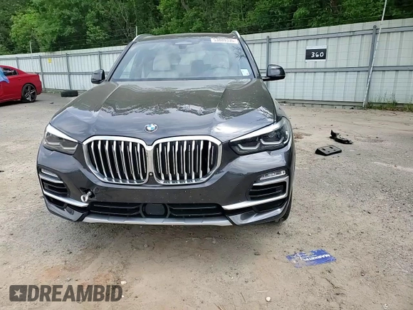2021 BMW X5 xDrive40i z VIN 5UXCR6C0XM9E79726, wystawiony jako Copart lot #53889335 z przebiegiem 64 221 mil mil oraz Szkoda całkowita • Salvage title. Historia ofert i sprzedaży dostępna na DreamBid. Obrazek 14.
