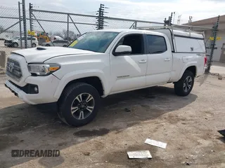 2017 Toyota Tacoma SR5 with VIN 3TMDZ5BN4HM018877, listed as a IAAI auction lot 41898666 with 198,848 mi miles. Bid and sale history available at carsss.com. Image 17.