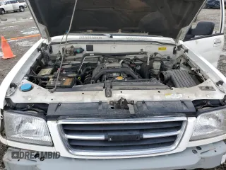 1999 Isuzu Trooper S z VIN JACDJ58XXX7922000, wystawiony jako Copart lot #48209835 z przebiegiem 127 024 mil mil oraz Szkoda całkowita • Salvage title. Historia ofert i sprzedaży dostępna na DreamBid. Obrazek 13.