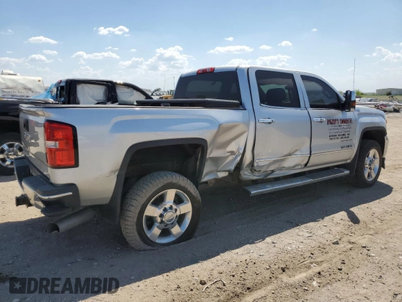 2016 GMC Sierra 2500HD SLT z VIN 1GT12TE84GF263081, wystawiony jako Copart lot #52894245 z przebiegiem 137 673 mil mil oraz Szkoda całkowita • Salvage title. Historia ofert i sprzedaży dostępna na DreamBid. Obrazek 3.