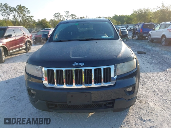 2012 Jeep Grand Cherokee Laredo with VIN 1C4RJFAG5CC234382, listed as a IAAI auction lot 42010153 with 185,078 mi miles. Bid and sale history available at carsss.com. Image 12.