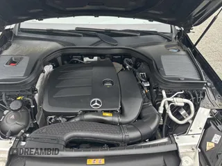 2021 Mercedes-Benz GLC 300 z VIN W1N0J8EB2MF904451, wystawiony jako Copart lot #57702365 z przebiegiem 117 769 mil mil oraz Czysty tytuł • Clean title. Historia ofert i sprzedaży dostępna na DreamBid. Obrazek 7.