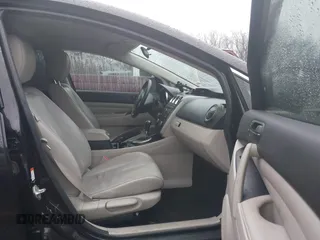 2010 Mazda CX-7 Grand Touring z VIN JM3ER4W32A0338657, wystawiony jako IAAI lot #41207462 z przebiegiem 257 713 mil mil oraz . Historia ofert i sprzedaży dostępna na DreamBid. Obrazek 5.