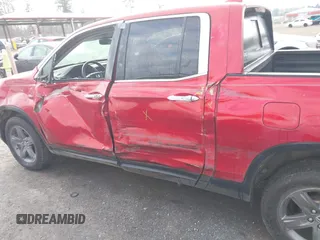 2022 Honda Ridgeline RTL-E with VIN 5FPYK3F74NB011358, listed as a IAAI auction lot 41431157 with 26,116 mi miles and . Bid and sale history available at DreamBid. Image 15.