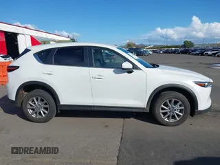 2023 Mazda CX-5 2.5 S Select Package with VIN JM3KFBBM9P0142478, listed as a IAAI auction lot 41724596 with 9,518 mi miles. Bid and sale history available at carsss.com. Image 14.