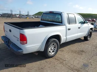 2003 Dodge Dakota Sport with VIN 1D7HL38X03S275203, listed as a IAAI auction lot 41992763 with 153,176 mi miles. Bid and sale history available at carsss.com. Image 4.