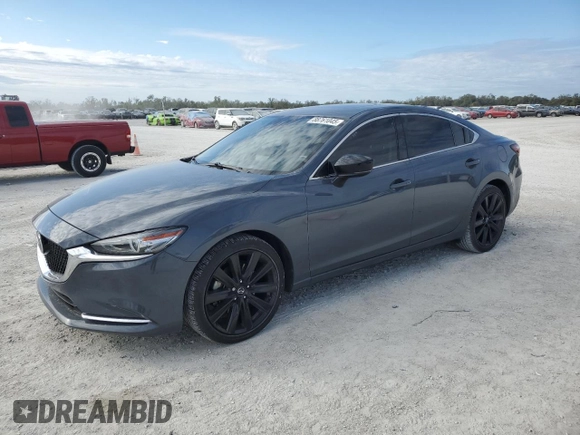 2021 Mazda 6 Carbon Edition with VIN JM1GL1WY6M1618139, listed as a Copart auction lot 88761045 with 82,377 mi miles and Non Repairable. Bid and sale history available at DreamBid. Image 1.