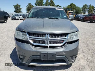 2012 Dodge Journey SXT z VIN 3C4PDDBG0CT345864, wystawiony jako Copart lot #55453875 z przebiegiem 142 444 mil mil oraz Szkoda całkowita • Salvage title. Historia ofert i sprzedaży dostępna na DreamBid. Obrazek 5.