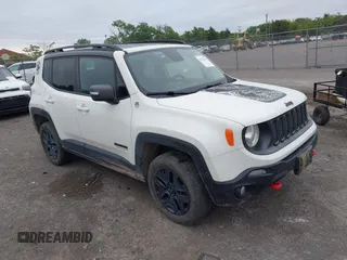 2017 Jeep Renegade Trailhawk with VIN ZACCJBCB5HPE81453, listed as a IAAI auction lot 42324446 with 99,710 mi miles and . Bid and sale history available at DreamBid. Image 1.