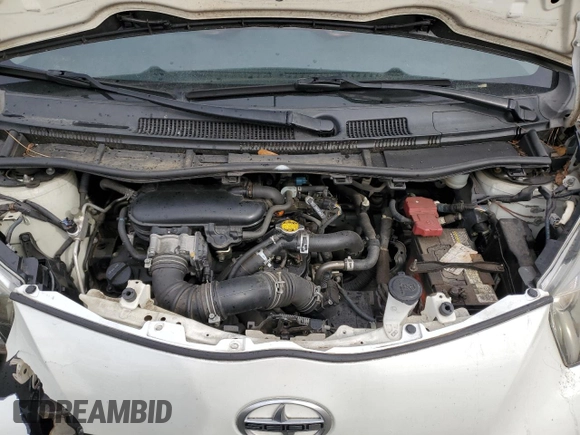 2012 Scion iQ with VIN JTNJJXB0XCJ011508, listed as a Copart auction lot 42368065 with 161,965 mi miles and Salvage title. Bid and sale history available at DreamBid. Image 11.
