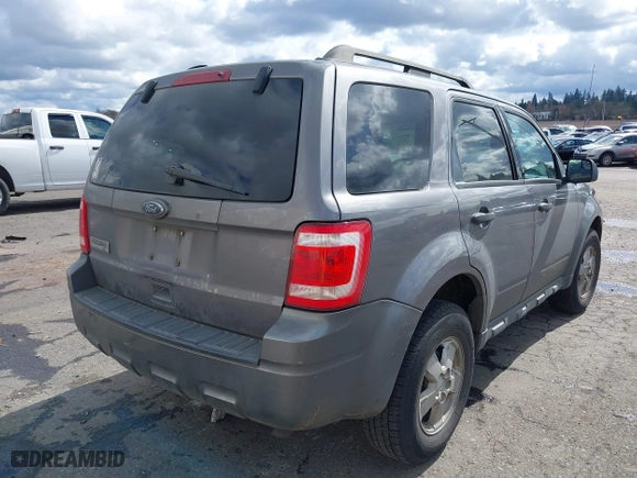 2010 Ford Escape XLT with VIN 1FMCU0D76AKA33885, listed as a IAAI auction lot 41837102 with 140,193 mi miles. Bid and sale history available at carsss.com. Image 4.