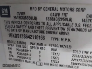 2004 GMC Envoy SLE with VIN 1GKDS13S642118163, listed as a IAAI auction lot 41809472 with 234,353 mi miles. Bid and sale history available at carsss.com. Image 9.