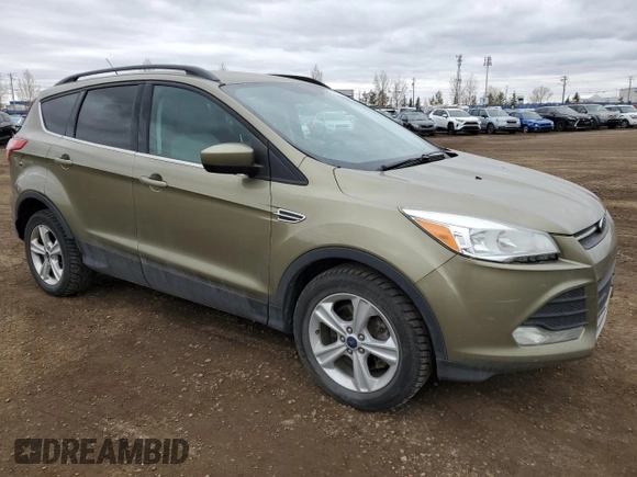 2014 Ford Escape SE with VIN 1FMCU9GX3EUB50432, listed as a Copart auction lot 50922755 with 276,474 mi miles and Clean Title. Bid and sale history available at DreamBid. Image 4.