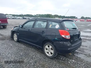2004 Toyota Matrix Std with VIN 2T1KR32E44C207298, listed as a IAAI auction lot 40333656 with 176,428 mi miles. Bid and sale history available at carsss.com. Image 3.