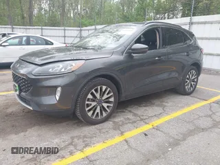 2020 Ford Escape Titanium with VIN 1FMCU9J96LUA00564, listed as a IAAI auction lot 42261152 with 73,748 mi miles and . Bid and sale history available at DreamBid. Image 19.