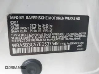 2014 BMW 5 Series 535i xDrive with VIN WBA5B3C57ED537549, listed as a IAAI auction lot 41047583 with 69,005 mi miles and . Bid and sale history available at carsss.com. Image 9.