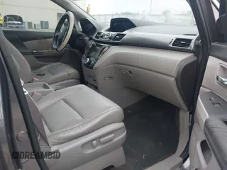 2014 Honda Odyssey Touring with VIN 5FNRL5H98EB008953, listed as a IAAI auction lot 42291179 with Not provided miles and . Bid and sale history available at DreamBid. Image 5.