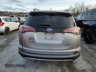2018 Toyota RAV4 Hybrid SE z VIN JTMJJREV0JD246230, wystawiony jako Copart lot #89095135 z przebiegiem Nie podano mil oraz Szkoda całkowita • Salvage title. Historia ofert i sprzedaży dostępna na DreamBid. Obrazek 6.