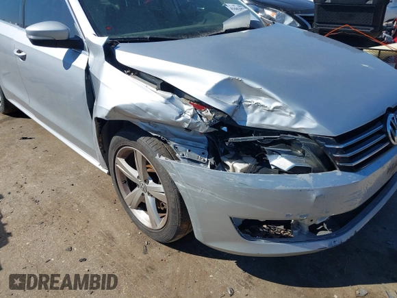 2013 Volkswagen Passat SE w/Sunroof with VIN 1VWBH7A34DC003147, listed as a IAAI auction lot 41662970 with 153,897 mi miles. Bid and sale history available at carsss.com. Image 6.