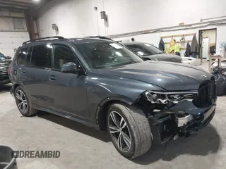 2021 BMW X7 xDrive40i z VIN 5UXCW2C01M9G97359, wystawiony jako IAAI lot #41616975 z przebiegiem 67 924 mil mil oraz . Historia ofert i sprzedaży dostępna na DreamBid. Obrazek 1.