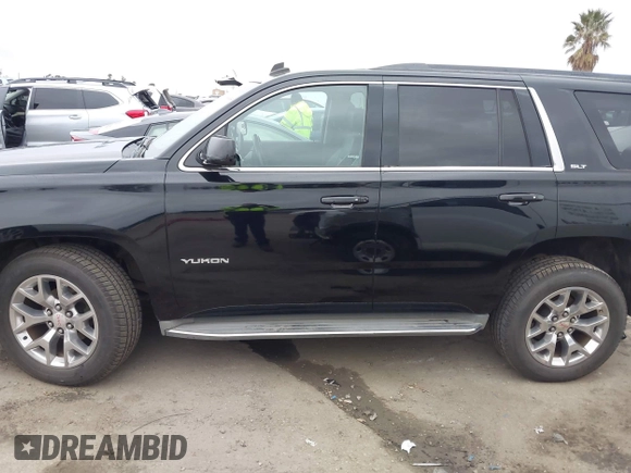 2015 GMC Yukon SLT with VIN 1GKS1BKC3FR129173, listed as a IAAI auction lot 41795585 with 97,893 mi miles. Bid and sale history available at carsss.com. Image 15.
