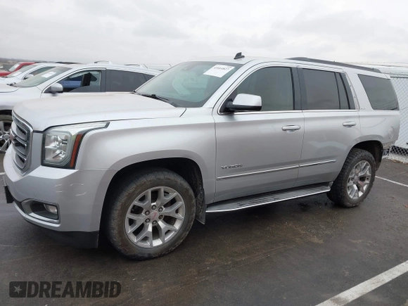 2015 GMC Yukon SLT with VIN 1GKS2BKCXFR131919, listed as a IAAI auction lot 41664827 with 149,398 mi miles. Bid and sale history available at carsss.com. Image 15.