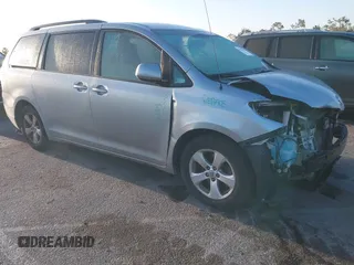 2014 Toyota Sienna LE AAS with VIN 5TDKK3DC1ES520561, listed as a IAAI auction lot 41959565 with 115,908 mi miles. Bid and sale history available at carsss.com. Image 1.