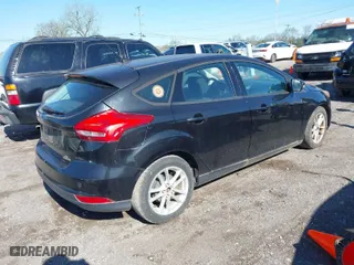 2015 Ford Focus SE with VIN 1FADP3K28FL214566, listed as a IAAI auction lot 42044521 with 172,289 mi miles. Bid and sale history available at carsss.com. Image 4.