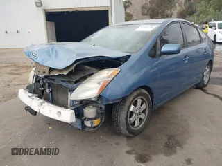 2007 Toyota Prius with VIN JTDKB20U477685445, listed as a IAAI auction lot 42020786 with 243,679 mi miles. Bid and sale history available at carsss.com. Image 2.