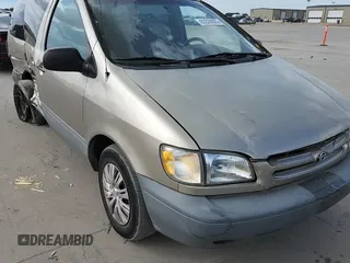 2000 Toyota Sienna LE with VIN 4T3ZF13C2YU218417, listed as a Copart auction lot 63328035 with 263,439 mi miles and Salvage title. Bid and sale history available at DreamBid. Image 14.