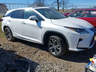 2018 Lexus RX with VIN JTJGZKCA1J2006400, listed as a IAAI auction lot 41717854 with 141,528 mi miles. Bid and sale history available at carsss.com. Image 1.