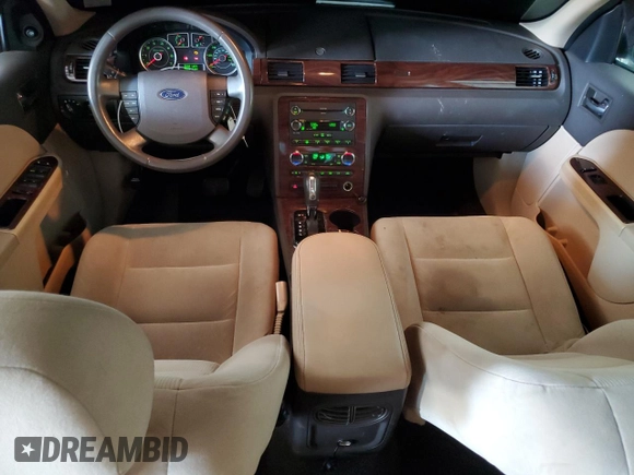 2008 Ford Taurus SEL with VIN 1FAHP24W38G146555, listed as a Copart auction lot 62092825 with 104,180 mi miles and Salvage title. Bid and sale history available at DreamBid. Image 8.