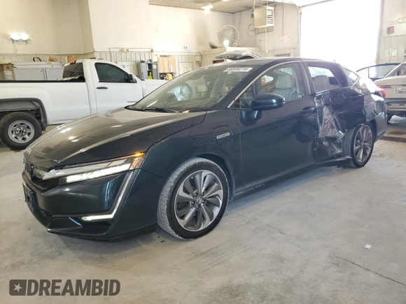 2018 Honda Clarity Plug-In Hybrid Touring with VIN JHMZC5F34JC019971, listed as a Copart auction lot 69590274 with 54,714 mi miles and Salvage Title. Bid and sale history available at carsss.com. Image 1.
