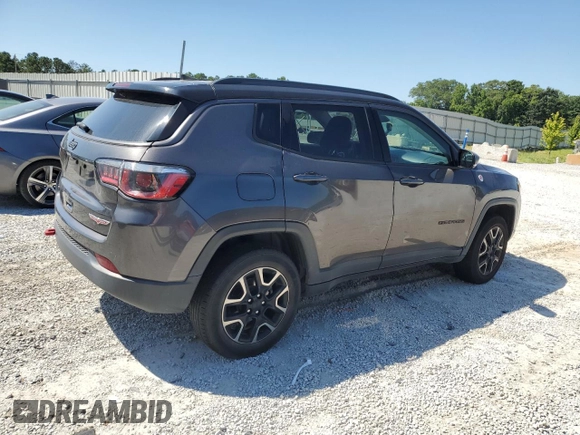 2019 Jeep Compass Trailhawk z VIN 3C4NJDDB1KT722170, wystawiony jako Copart lot #65063285 z przebiegiem 91 809 mil mil oraz Czysty tytuł • Clean title. Historia ofert i sprzedaży dostępna na DreamBid. Obrazek 3.