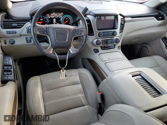 2019 GMC Yukon Denali with VIN 1GKS1CKJ8KR353280, listed as a Copart auction lot 77316454 with 74,476 mi miles and Salvage Title. Bid and sale history available at carsss.com. Image 8.