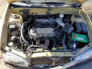 1997 Mitsubishi Mirage z VIN JA3AY36A9VU027615, wystawiony jako Copart lot #77401214 z przebiegiem 104 407 mil mil oraz Szkoda całkowita • Salvage title. Historia ofert i sprzedaży dostępna na DreamBid. Obrazek 12.