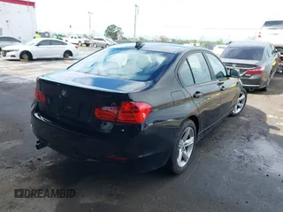 2015 BMW 3 Series 328i with VIN WBA3C1C53FK119723, listed as a IAAI auction lot 41871200 with 112,552 mi miles and . Bid and sale history available at carsss.com. Image 4.