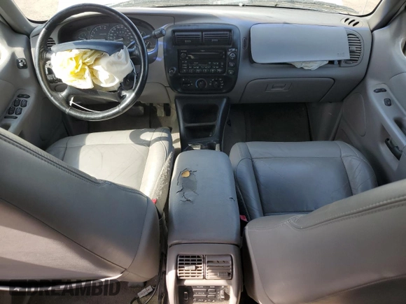 2000 Ford Explorer XLT with VIN 1FMZU83PXYZA71034, listed as a Copart auction lot 55447585 with 175,118 mi miles and Salvage title. Bid and sale history available at DreamBid. Image 8.