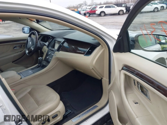 2015 Ford Taurus Limited with VIN 1FAHP2F85FG117635, listed as a IAAI auction lot 41979311 with 104,314 mi miles. Bid and sale history available at carsss.com. Image 5.