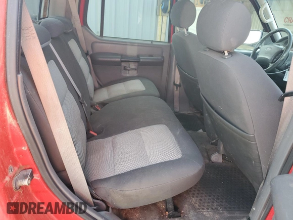 2005 Ford Explorer Sport Trac XLS z VIN 1FMZU77K85UC00311, wystawiony jako Copart lot #57558555 z przebiegiem 181 343 mil mil oraz Czysty tytuł • Clean title. Historia ofert i sprzedaży dostępna na DreamBid. Obrazek 10.