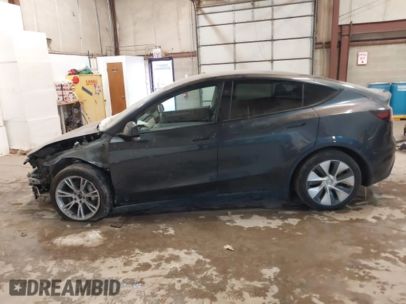 2024 Tesla Model Y Long Range with VIN 7SAYGDEE0RA282634, listed as a IAAI auction lot 41627510 with 23,054 mi miles and . Bid and sale history available at DreamBid. Image 15.
