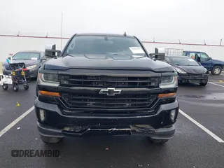 2017 Chevrolet Silverado 1500 LT with VIN 1GCUKREC1HF117744, listed as a IAAI auction lot 41091255 with 61,984 mi miles and . Bid and sale history available at DreamBid. Image 12.