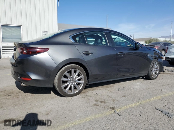 2021 Mazda 3 Select with VIN 3MZBPABL6MM250571, listed as a Copart auction lot 54455515 with 33,460 mi miles and Salvage title. Bid and sale history available at DreamBid. Image 3.
