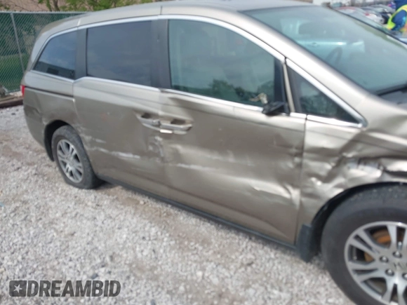 2013 Honda Odyssey EX-L with VIN 5FNRL5H65DB064238, listed as a IAAI auction lot 42050743 with 189,437 mi miles and . Bid and sale history available at carsss.com. Image 17.