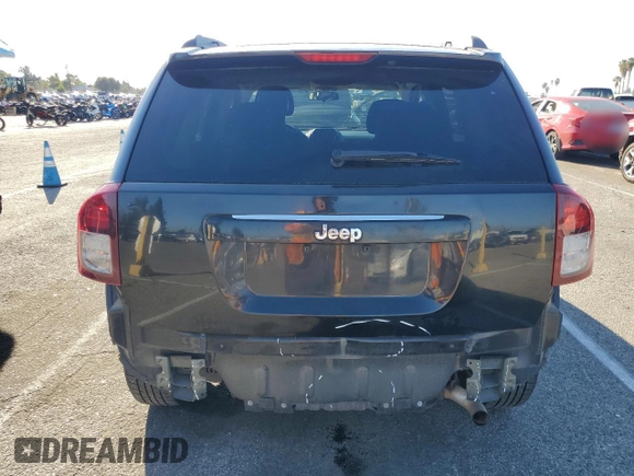 2015 Jeep Compass Sport with VIN 1C4NJCBA1FD190757, listed as a Copart auction lot 46546335 with 104,060 mi miles and Salvage Title. Bid and sale history available at carsss.com. Image 6.