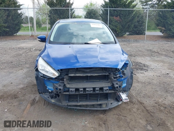 2018 Ford Focus Titanium z VIN 1FADP3N26JL325931, wystawiony jako IAAI lot #42096503 z przebiegiem 106 338 mil mil oraz . Historia ofert i sprzedaży dostępna na DreamBid. Obrazek 12.
