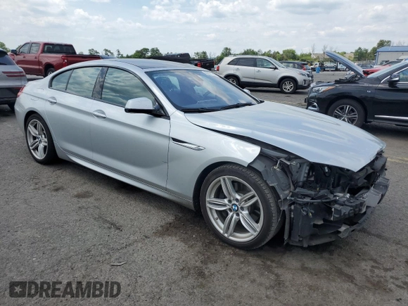2015 BMW 6 Series 640i xDrive z VIN WBA6B8C53FD453229, wystawiony jako Copart lot #60371214 z przebiegiem 116 624 mil mil oraz Szkoda całkowita • Salvage title. Historia ofert i sprzedaży dostępna na DreamBid. Obrazek 4.