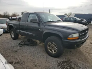 2003 Dodge Dakota с VIN 1D7HG32X93S273172, выставлен на аукционе Copart как лот 80704424 с пробегом 141 409 миль миль и Списание • Salvage title. История ставок и продаж доступна на DreamBid. Изображение 4.