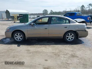 2005 Nissan Altima 3.5 SE with VIN 1N4BL11DX5C353106, listed as a IAAI auction lot 41833288 with 148,146 mi miles. Bid and sale history available at carsss.com. Image 14.